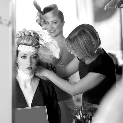 backstage hairdressing and makeup fashion with make-up artist