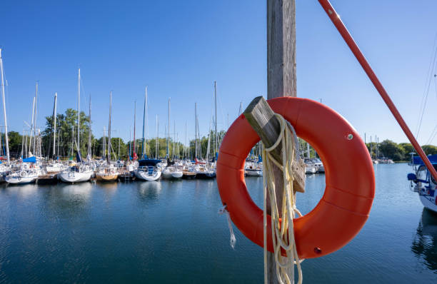 boia de vida em um porto de iate - life belt nautical vessel life jacket buoy - fotografias e filmes do acervo