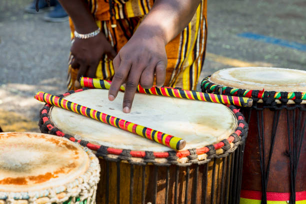istock African hands pointing to his country's drums 1342510163