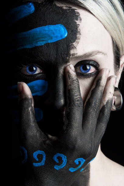 istock Four elements themed artistic female portrait body paint makeup 1342513884