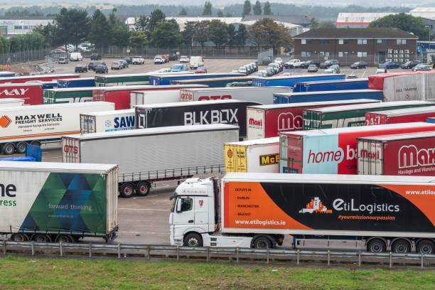 Trailers and trucks queued to board a ferry to cross the Irish Sea stock photo