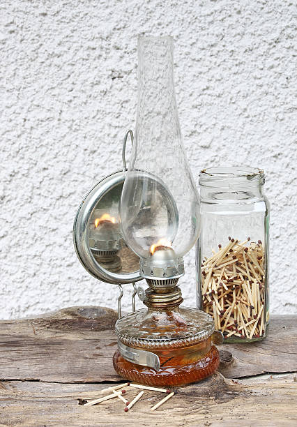 antique kerosene lamp with a glass bulb stock photo