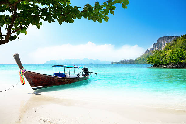istock long boat and poda island in Thailand 134252992