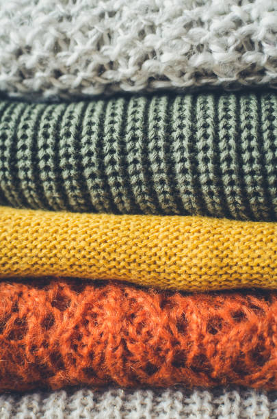 istock Pile of knitted woolen sweaters 1342530718