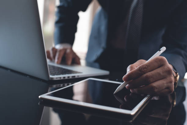 istock Businessman working in modern office 1342531028