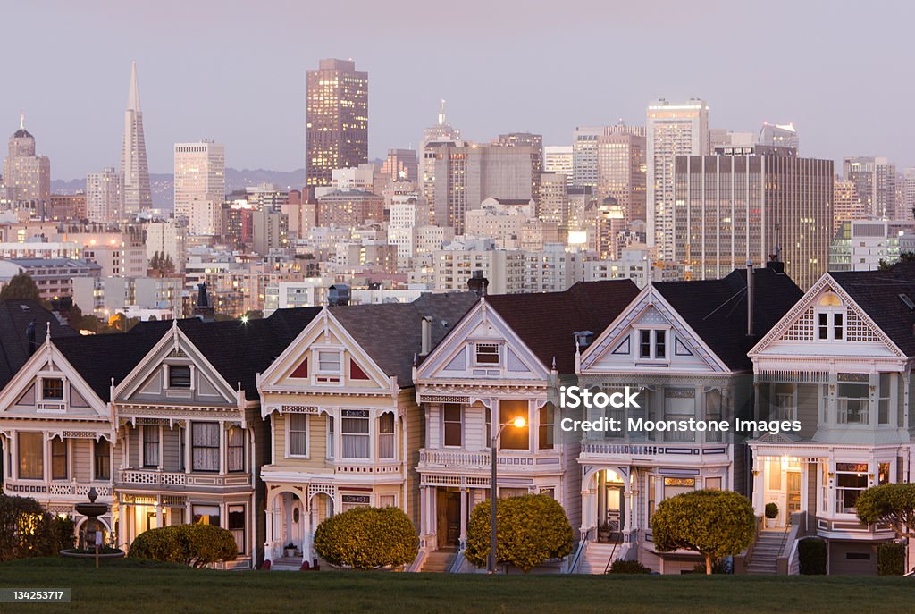 Alamo Square in San Francisco, California Located on the eastern end of the steeply sloping Alamo Square, the picturesque, Queen Anne-style Victorian houses are also known as the Painted Ladies, Postcard Row or the Seven Sisters. 19th Century Style Stock Photo