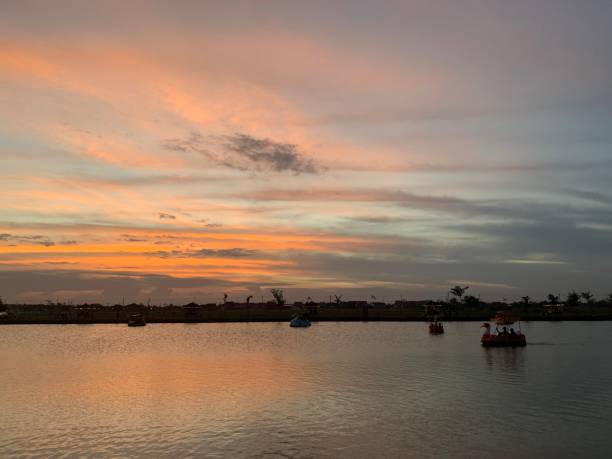 istock Sunset view at a fishing pond 1342544024