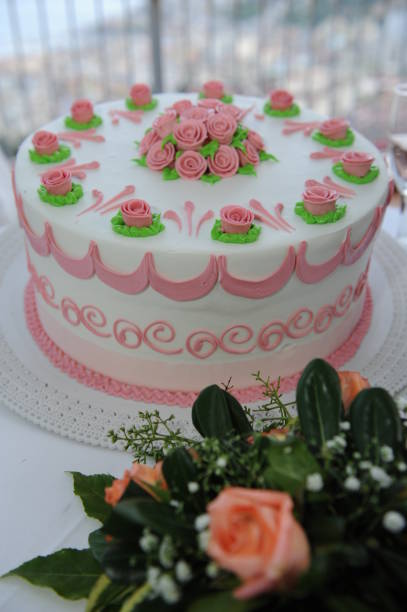 istock Wedding cake ready to be cut by the newlyweds. 1342552635