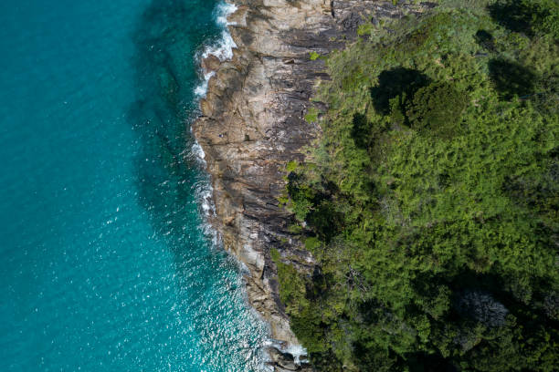 istock Aerial view Top down seashore wave crashing on seashore Beautiful turquoise sea surface in sunny day Good weather day summer background Amazing seascape top view 1342577668