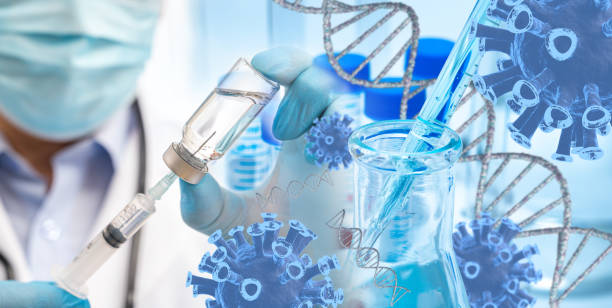 The doctor's hand wearing blue gloves against white background and holding Covid-19 vaccine stock photo