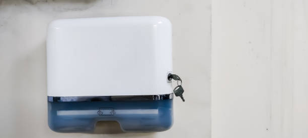 istock Tissue box isolated on wall. Cleaning concept. hand tissue towel. closeup. 1342586121