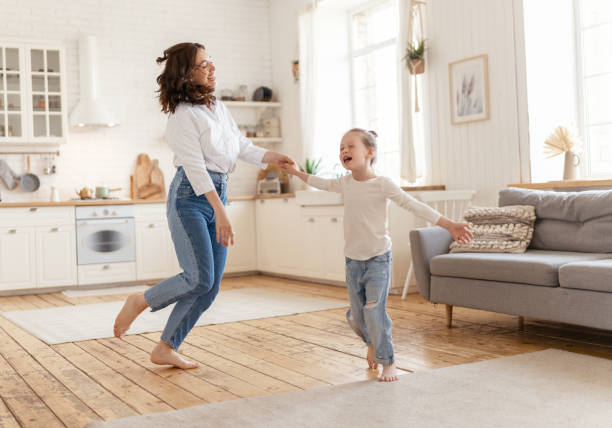 istock Mom and her daughter are dancing. 1342587189