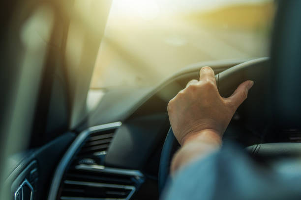 istock Caucasian Female Permit Driver Behind the Car Wheel 1342587355