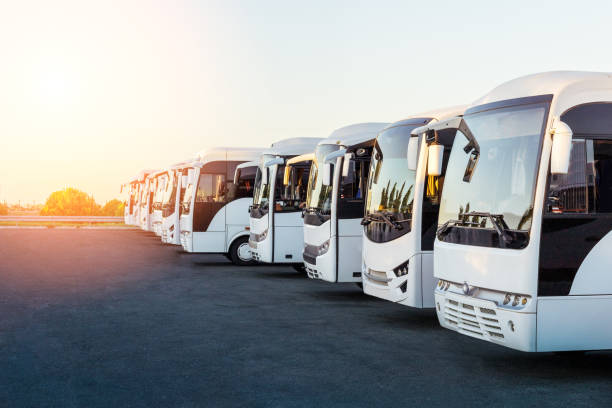 istock Tourist buses on parking at sunrise or sunset. 1342587750