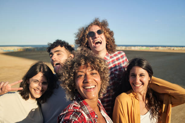 istock Multiracial group of young people taking selfie and having fun. 1342591278