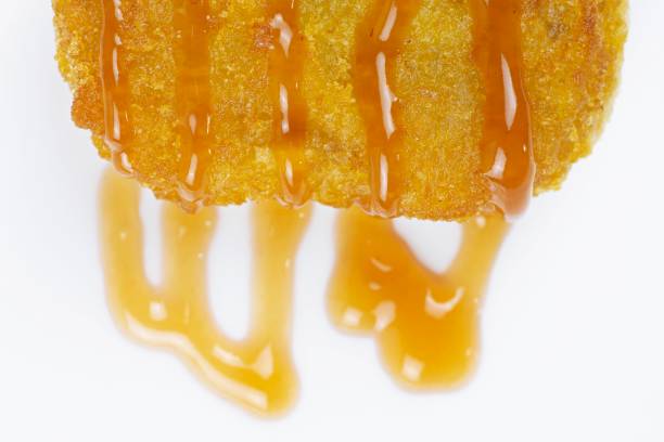 istock Closed up Tomato Ketchup on Chicken Nugget. 1342593031