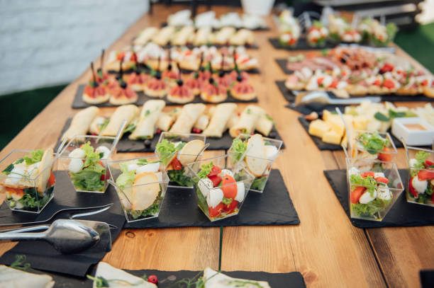 istock Buffet table of reception with cold snacks, meat and salads 1342602075
