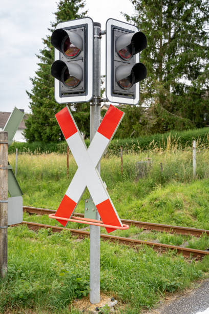 istock Two traffic lights at a railroad crossing 1342602368
