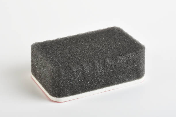 Polishing and cleaning sponge isolated on the white background Polishing and cleaning sponge isolated on the white background shoe polish stock pictures, royalty-free photos & images