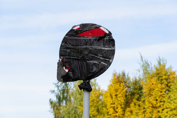 istock The road sign is covered with a black bag during road works 1342606783