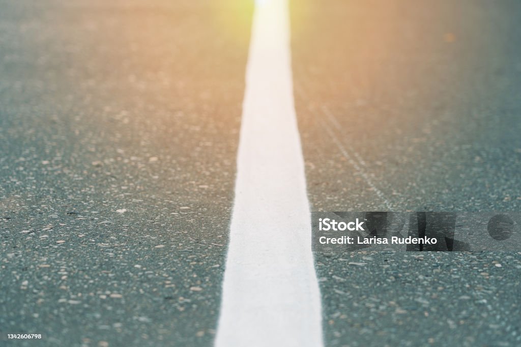 white line of road markings on the asphalt Asphalt Stock Photo