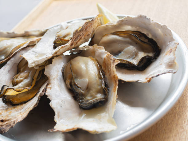 istock Baked Oysters on a Plate 1342607772