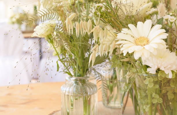 istock View with a small green bouquet with a light gerbera 1342610098
