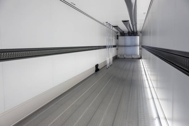 cargo empty semi-trailer with a clean floor stock photo