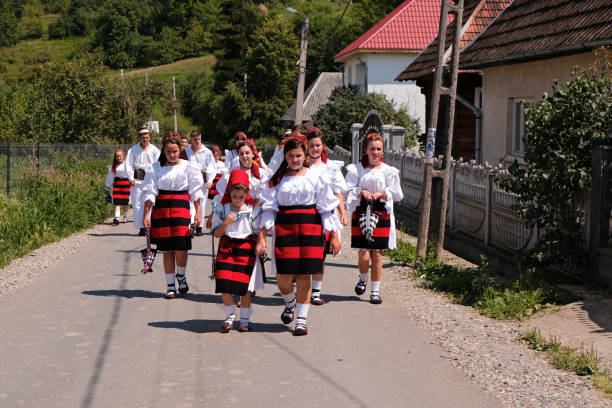 Exploring Maramures Breb , Maramures, Romania - August 8, 2020. Locals dressed in traditional clothes in Breb Village, Maramures, Romania maramureș stock pictures, royalty-free photos & images
