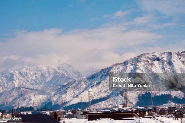 Beautiful Mountain And Rural View With Cloudy Sky At Winter Season In A Japan Stock Photo - Download Image Now