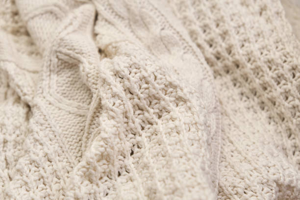 istock Hand made cable-knit sweater sweater close up 1342625593