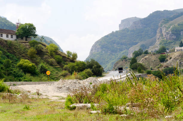 asphalt mountain road among mountains stock photo