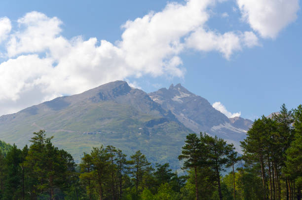 peaks of the Caucasus Mountains in early autumn stock photo