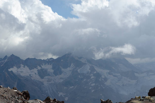 peaks of the main Caucasian ridge in the haze stock photo