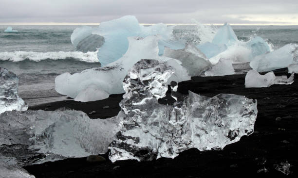 istock Glacial ice washed ashore at Diamond Beach, Iceland 1342629301