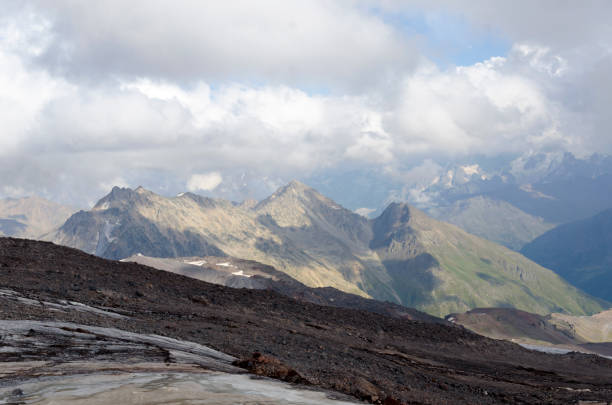 glaciers in the north caucasus mountains in early autumn stock photo