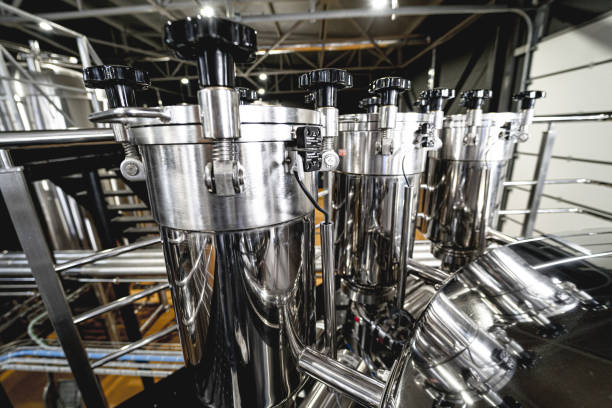 istock Craft beer brewing equipment in privat brewery 1342631172