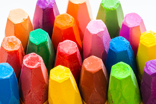 colorful crayon on paper background