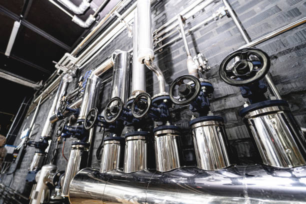 istock The valves and pipes at a craft modern brewery wall 1342631249