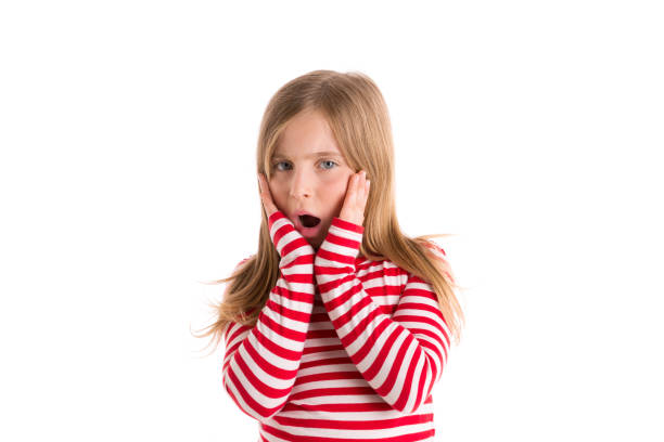 istock Blond kid girl sad surprised gesture expression 1342632419