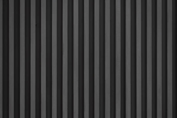 istock black steel stried background and texture. metal wall. 1342632797