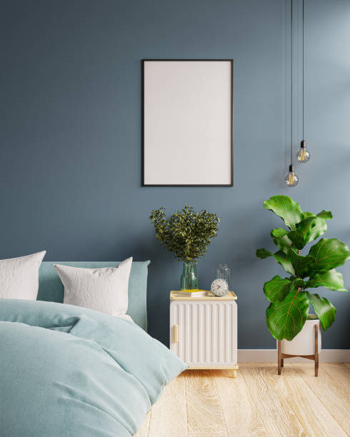 istock Mock up frame in bedroom interior dark blue background. 1342643399