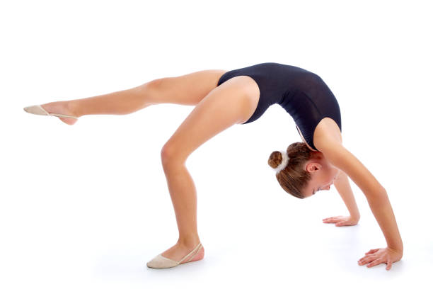 istock Kid girl rhythmic gymnastics exercises on white 1342678687