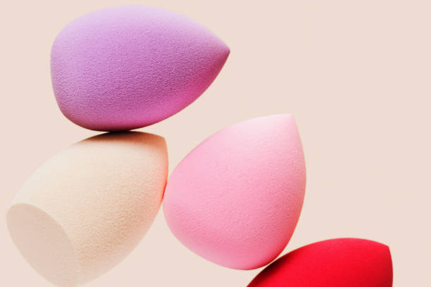istock Colored cosmetic beauty blender sponges Red and pink colored sponges different shape. 1342687473