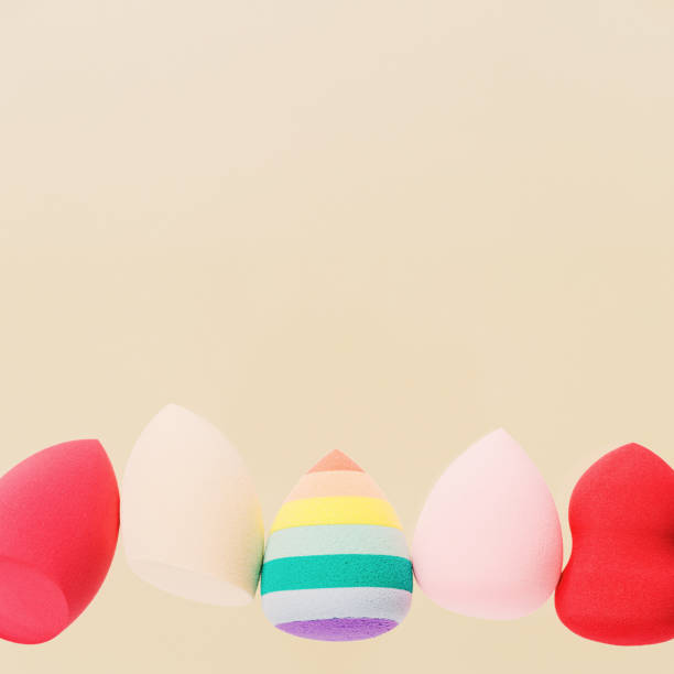 istock Colorful cosmetic beauty sponges different form Red, pink, rainbow colored makeup tools 1342687474