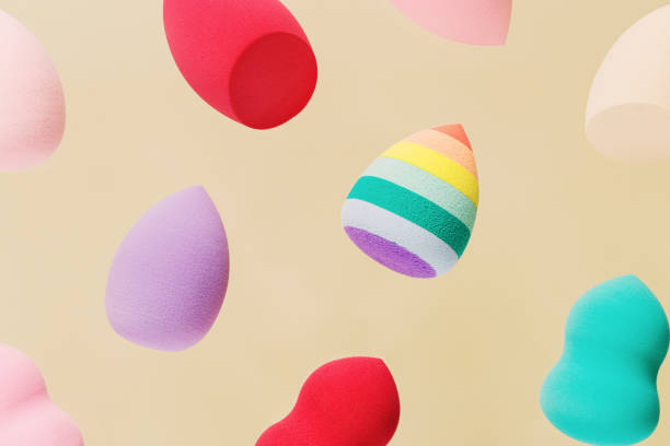 istock Pattern from color cosmetic beauty blender sponges Flying colored sponges different shape. 1342687476