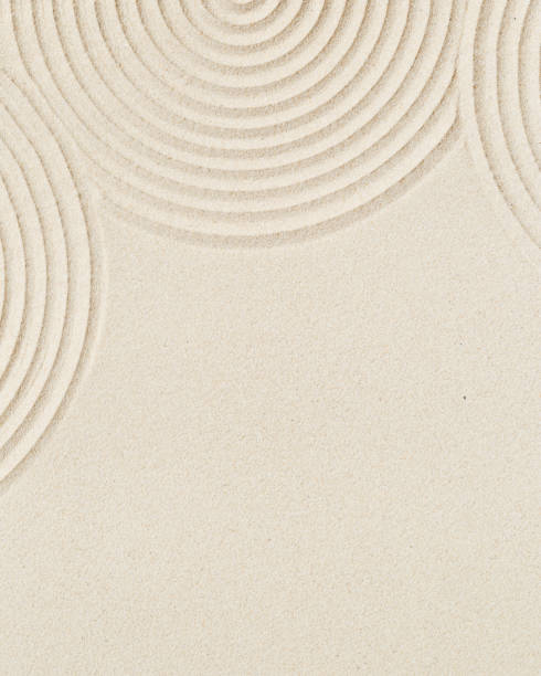 istock Pattern in Japanese Zen Garden with concentric circles on sand for meditation and tranquility 1342687485