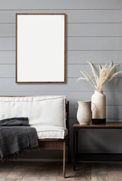 istock Artwork mock-up in interior design. Blank white picture frame on a gray wall 1342711203