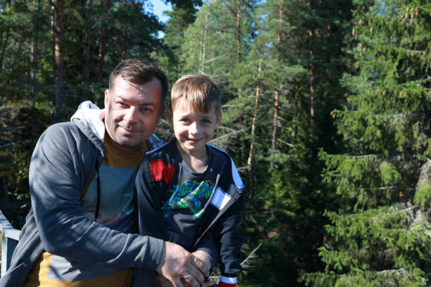 istock Father with son in forest at Gora Filina 1342713918