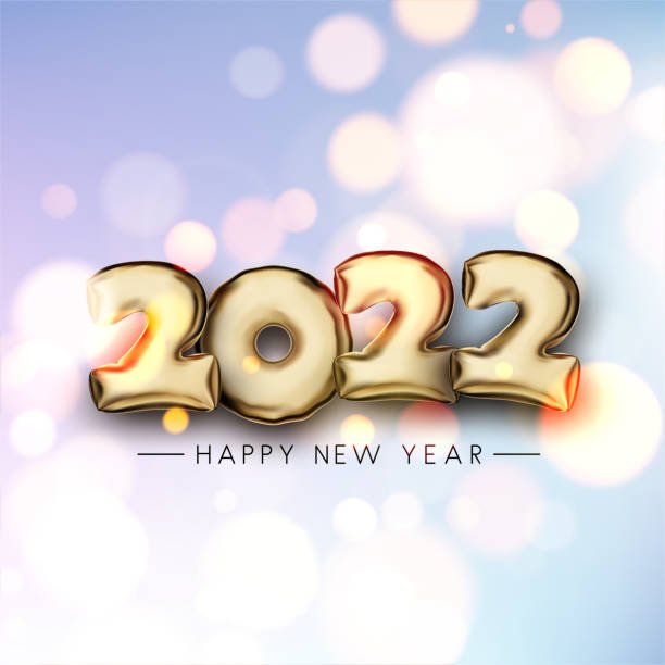istock 2022 golden bokeh balloon sign. 1342714669